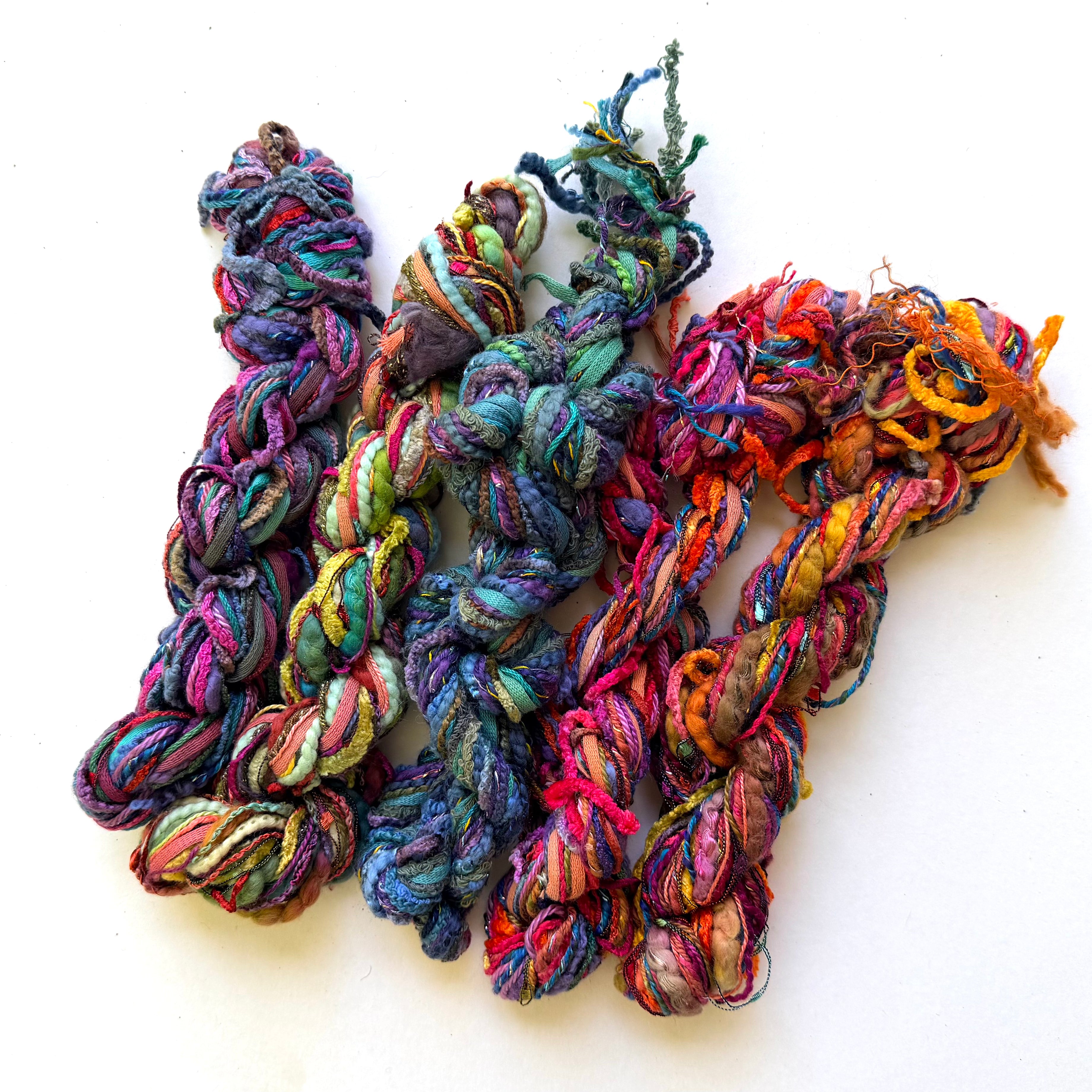 Blue Heron Yarns Mixed Novelty Rayon Ribbon Bouclé Sari silk style Metallic Accents Hand painted Bulky Yarn, Mixed Jewel Tones Purples, Teals, Rusts, Magentas, Mossy Greens, Discontinued